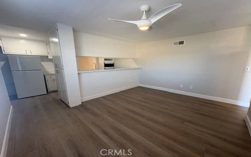 Nice sized dining area in the family kitchen with brand new remote controlled ceiling fan and light.