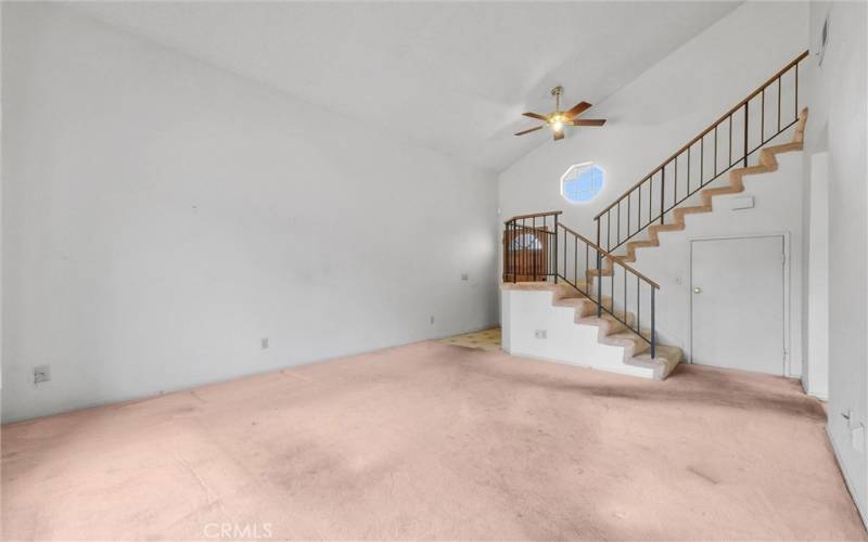 Living room view of staircase