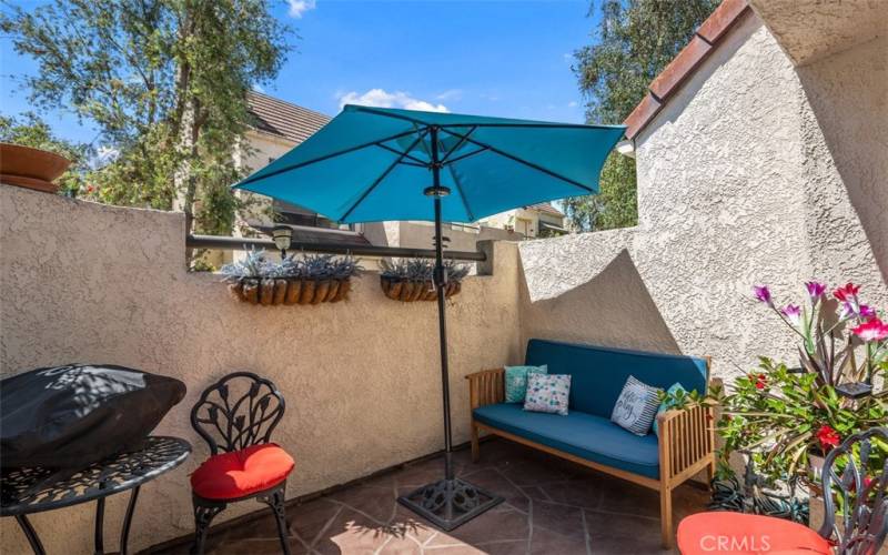 Attached patio is great for relaxing and eating al-fresco.