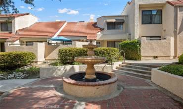 Beautiful fountain right outside door offers ambiance and relaxing sounds