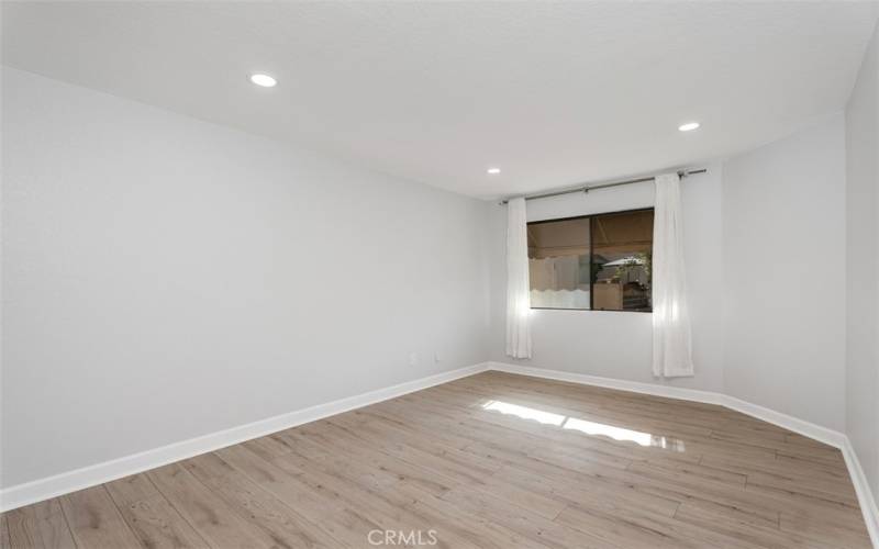 Primary bedroom was remodeled with beautiful wood vinyl flooring and fresh paint.