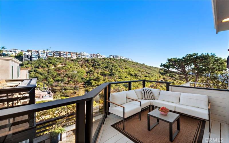 Sitting area on primary deck just off living room