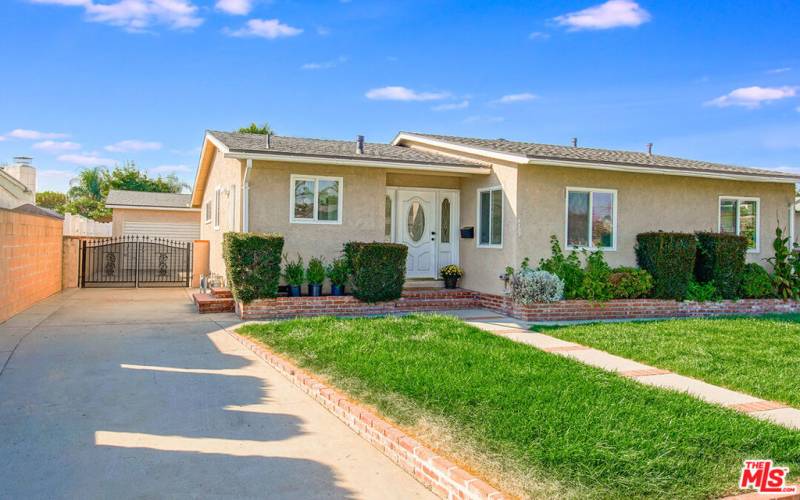 front house and gated driveway