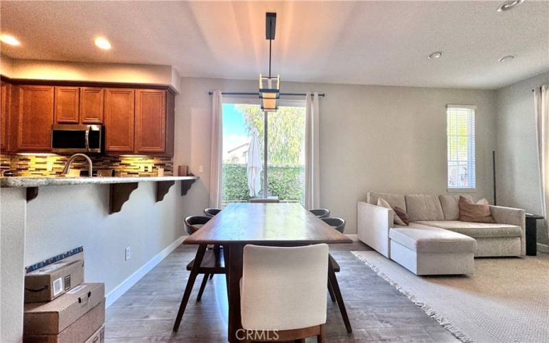 Dining area with french door leads to private side yard