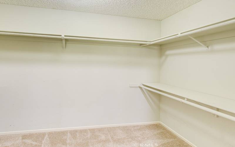 Here's the spacious walk in closet that is just off the primary bedroom.