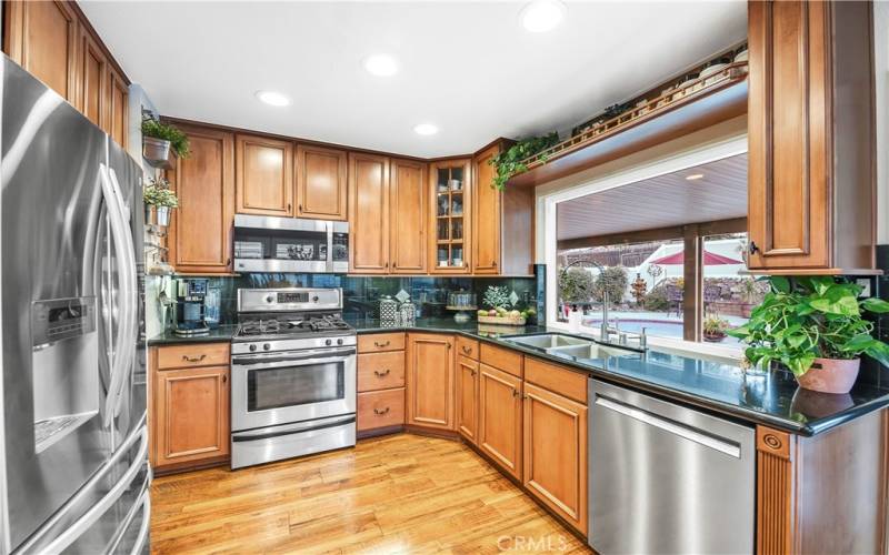 Maple Cabinets, Granite Counter Tops, Enlarged Picture Window, Stainless Steel Appliances