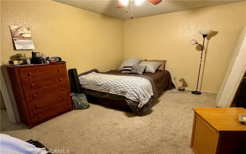 Upstairs front bedroom with access to balcony