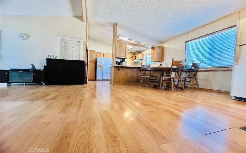 Living room opens to dining area - View 10