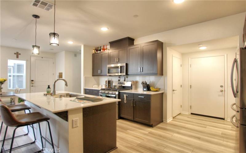 Kitchen and door leading into garage.