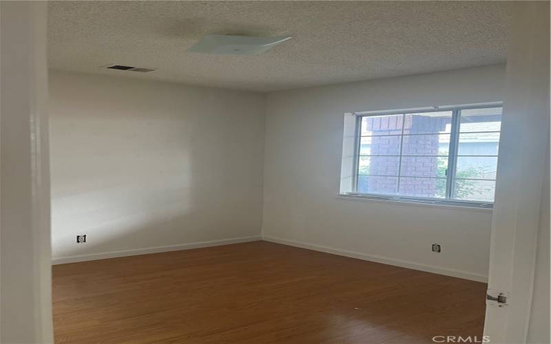 Guest bedroom with walk-in closet