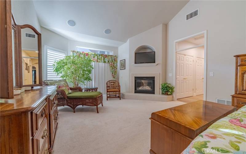 Master Bedroom with sitting area and gas log fireplace.