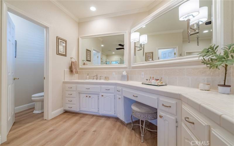 Master Bedroom Bath with separate toilet area behind closed doors.