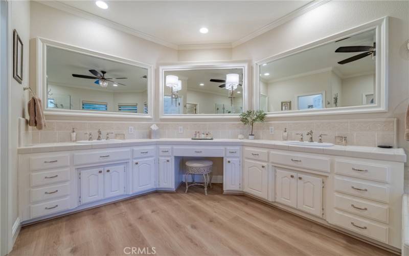 Master Bedroom Bath with dual sinks, and makeup area. Plus, an abundance of cabinet space.