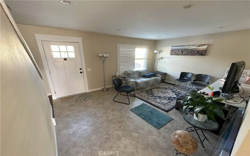 View of front door and family room