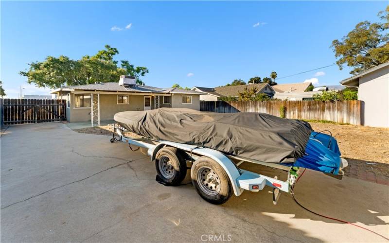 Backyard is spacious enough for parking toys/RV