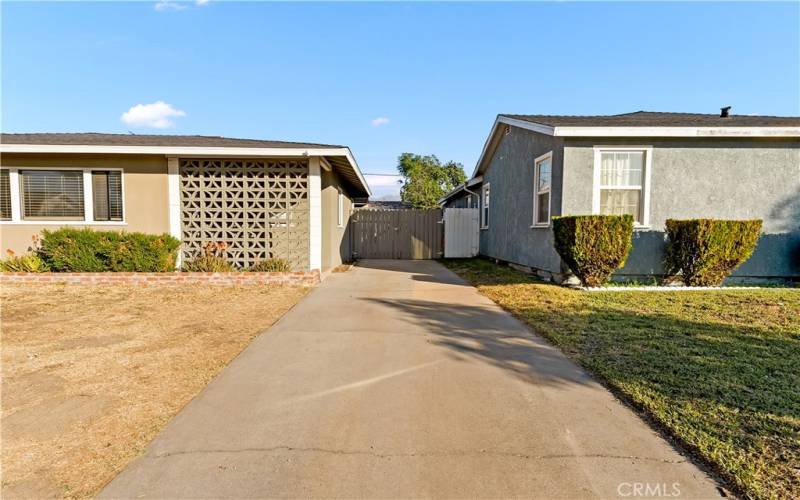 Long driveway leads to the detached 2 car garage