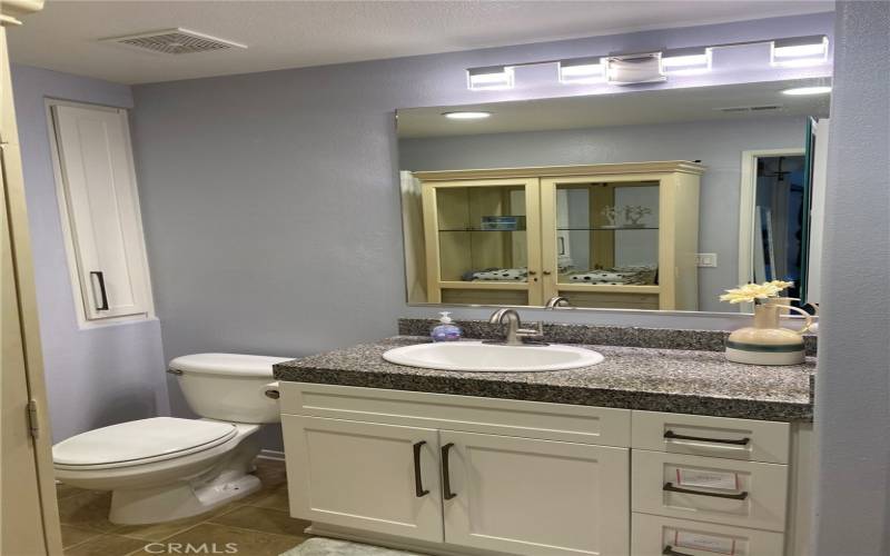 Bathroom, granite countertop updated vanity.