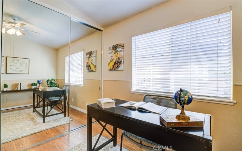 The mirrored wardrobe adds to the spacious feel of the room.