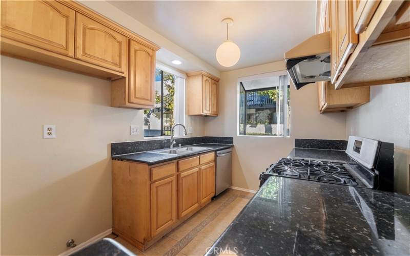 Spacious beautiful kitchen with granite counter tops and Dish washer.
