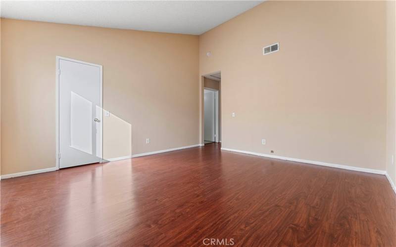 Upstairs second bedroom with beautiful wooden floors. Newly pained.