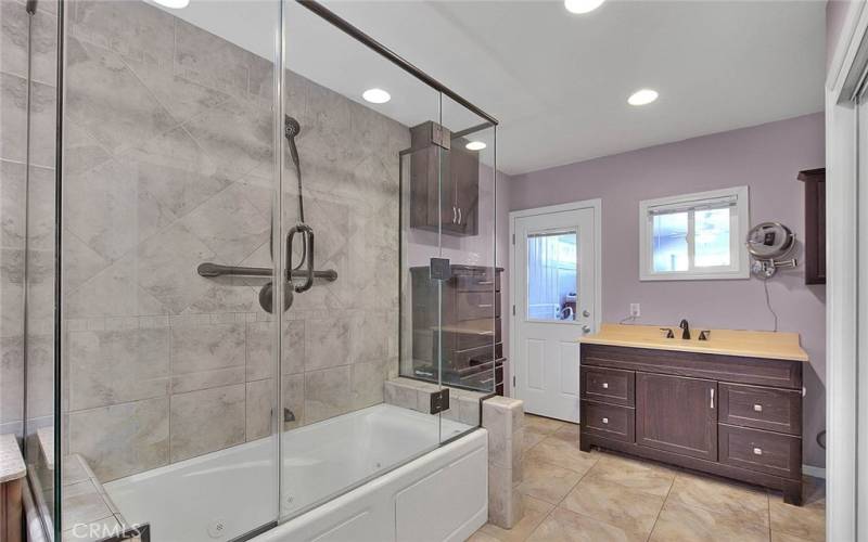 Tiled shower with frameless doors