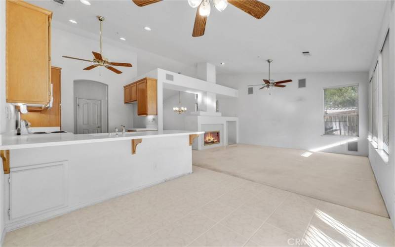 Family dining area with kitchen and family room.