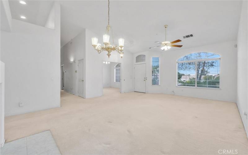 Formal dining area, living room and den.