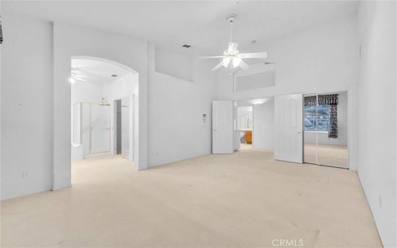 Master bedroom leading to master bath.  Two mirrored closets.