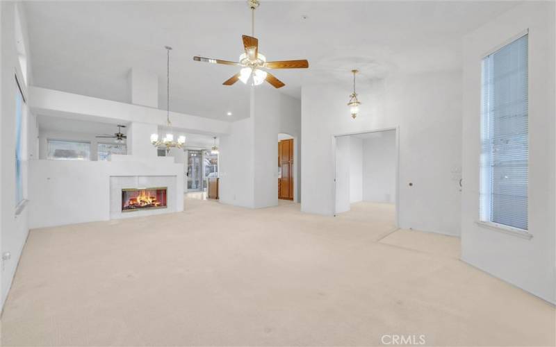 Large living room with den off to the side.