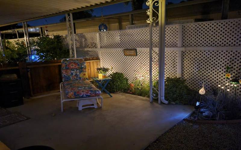 PRIMARY BEDROOM PATIO AT NIGHT