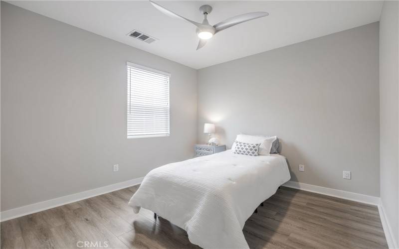 Bedroom #2 w/modern ceiling fan, 2 toned paint.