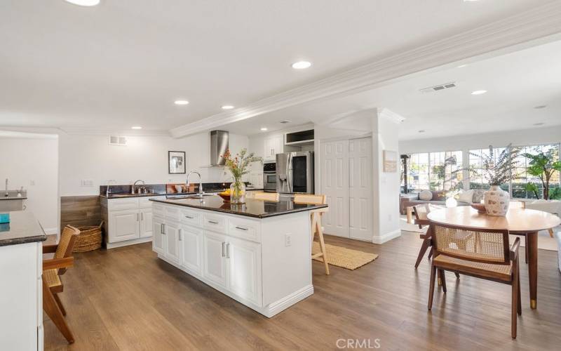 Open floor plan between dining area and kitchen!