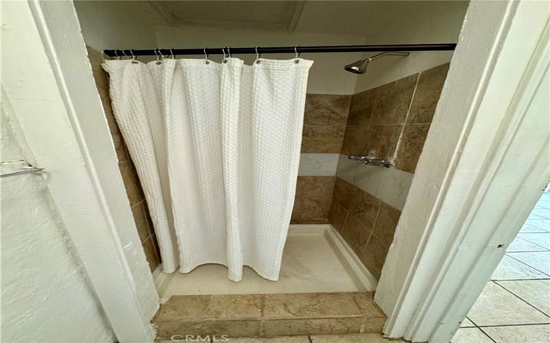 unpermitted shower third unit