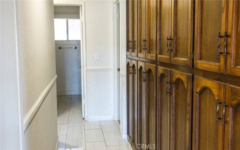 Lots of build-in cabinet for storage in the hallway to the rooms