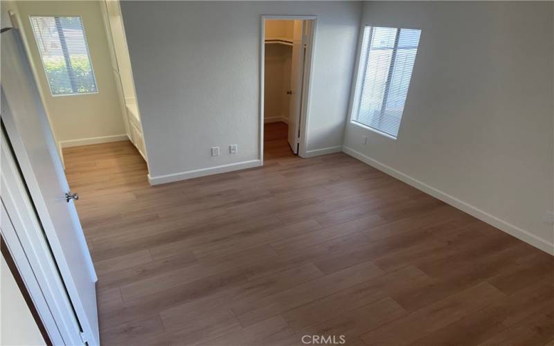 Master Bedroom with Vanity and Walk-In Closet