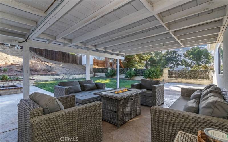 Picture yourself on the comfortable covered patio