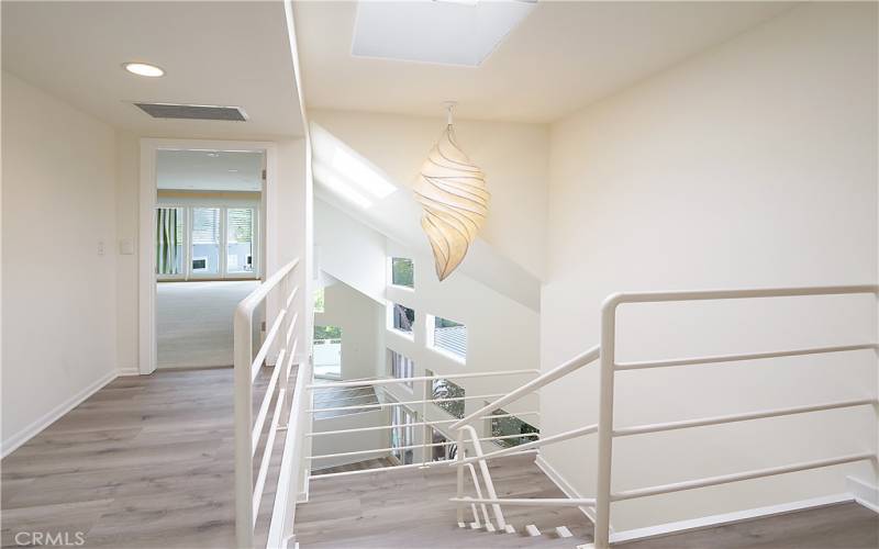 Top Level Hallway Leading to Primary Bedroom