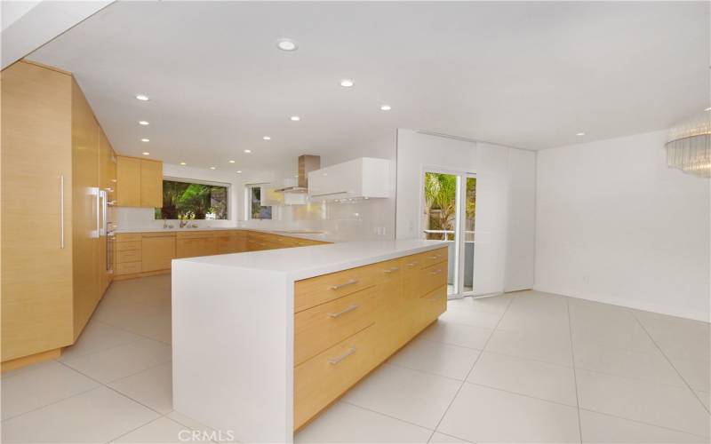 Kitchen Opens to Dining Area and Patio