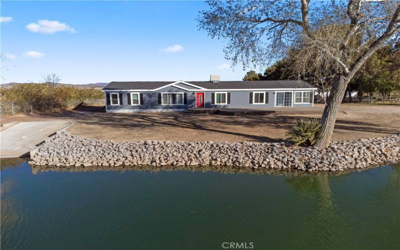 Lake side of house with deck