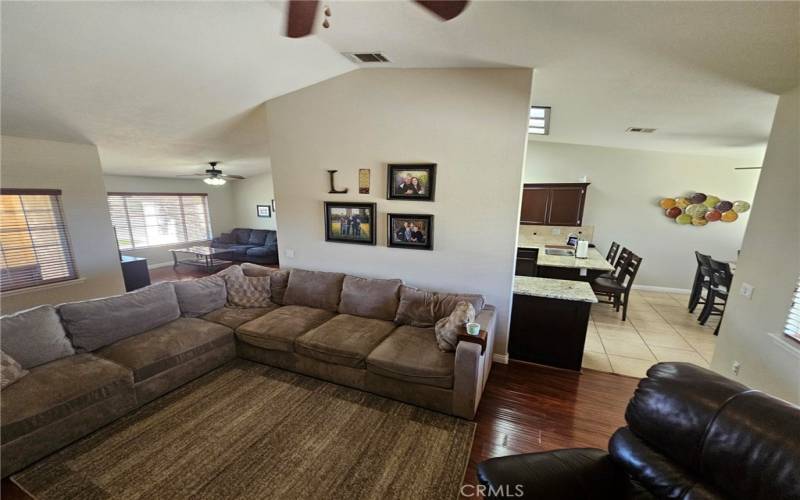 Living Room with view of the Kitchen & the Family Room