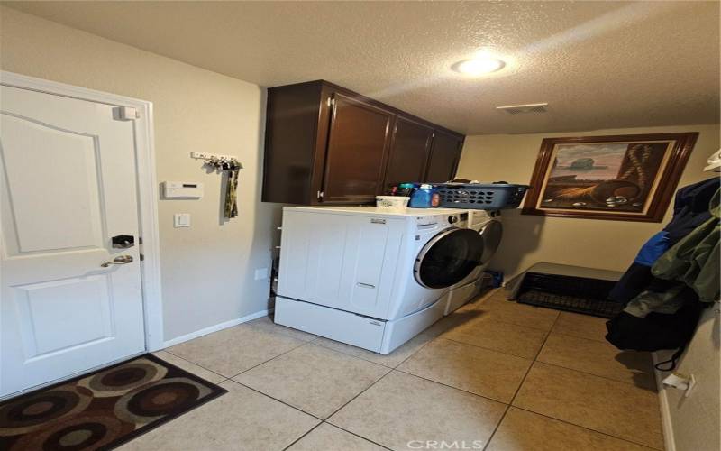 Laundry Room with access to the Garage