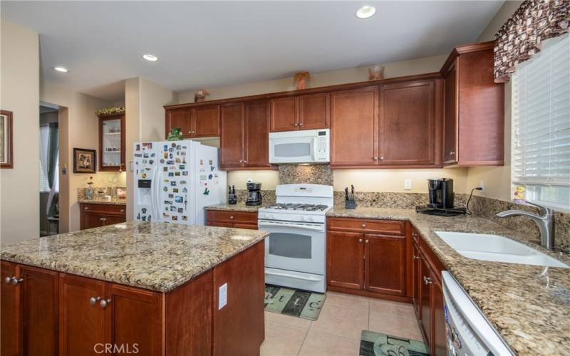 Kitchen and island with granite counter tops