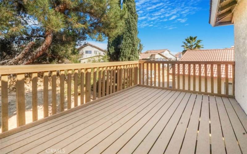 Master Bedroom Sliders Lead out to a Balcony