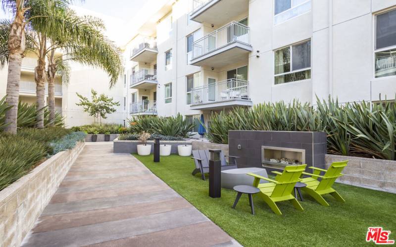 Community Fire Pit and BBQ Area, adjacent to the unit