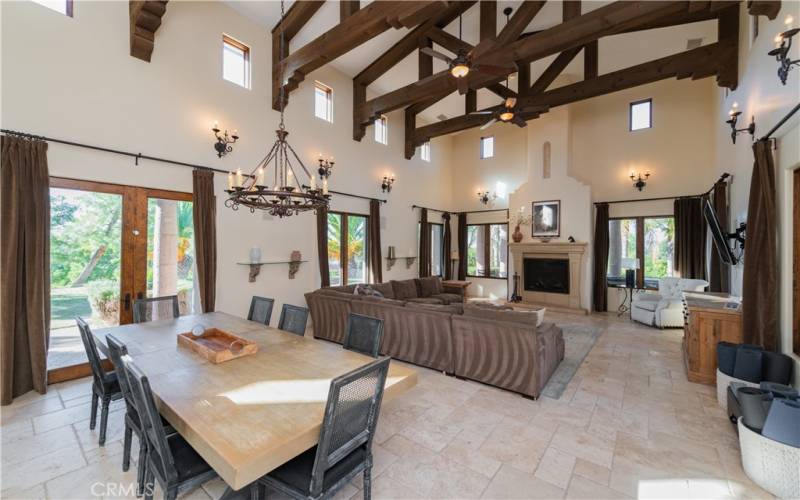 Formal dining room and cozy family room with fireplace