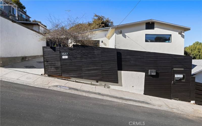 Plenty of parking out front plus no one will block your driveway