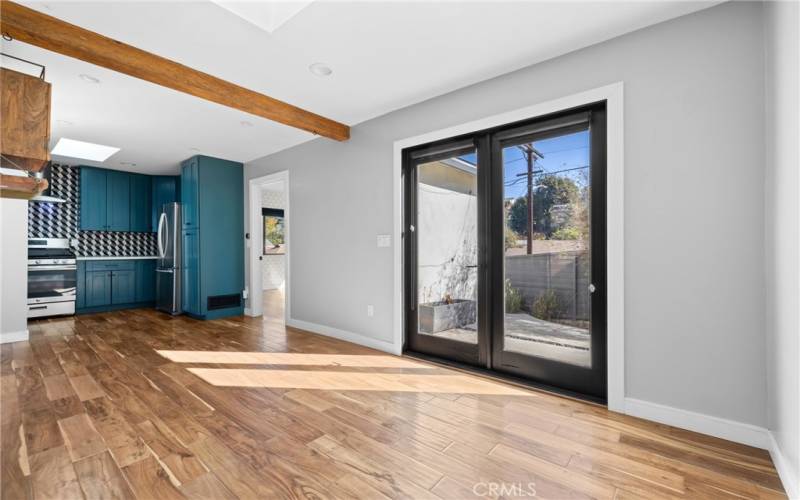 Living room opens to kitchen , bathroom and kitchen