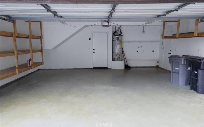 Garage with laundry and access to family room and backyard