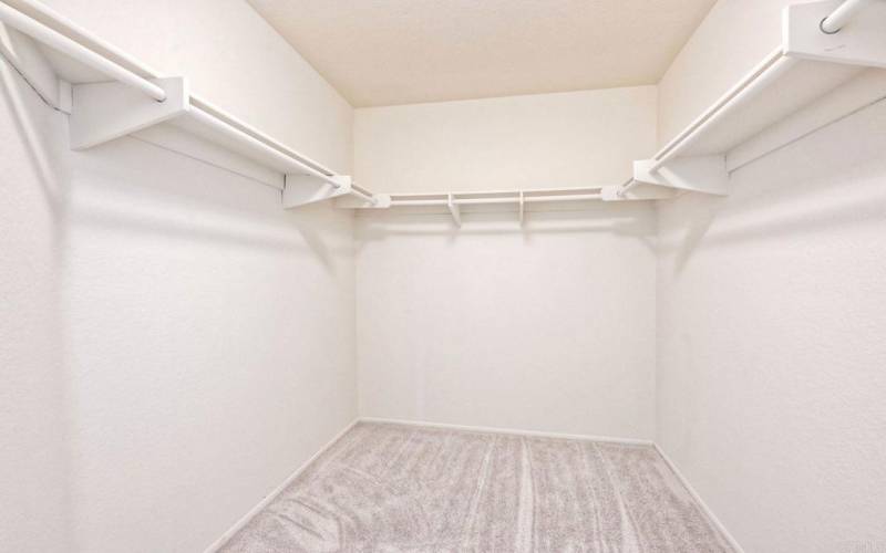 primary bedroom walk in closet