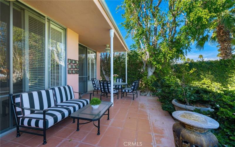 Relax on your private patio with stunning desert views and palm trees.